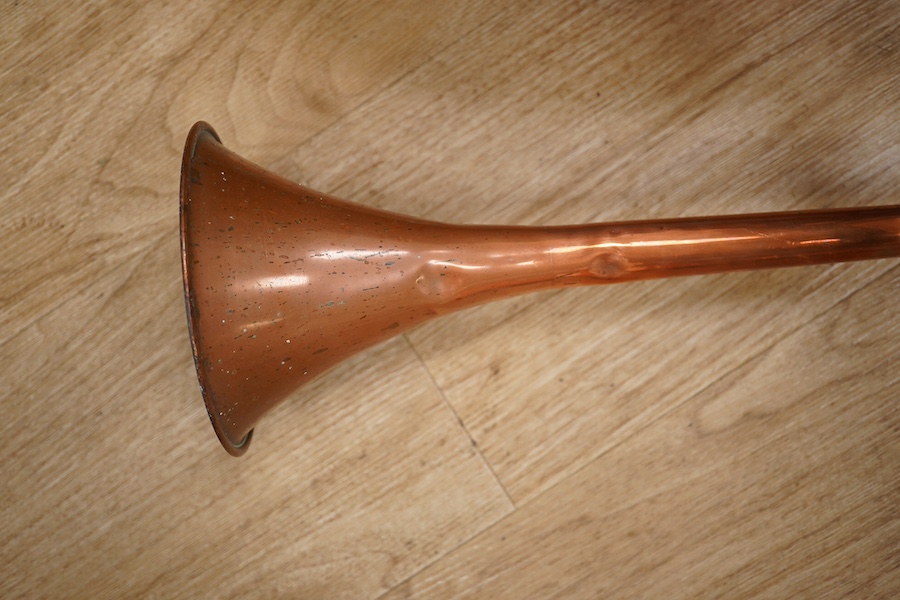 Victorian copper, including a two handled preserve pan, a copper hunting horn, a helmet coal scuttle and a warming pan. Scuttle 32cm high. Condition - hunting horn dented